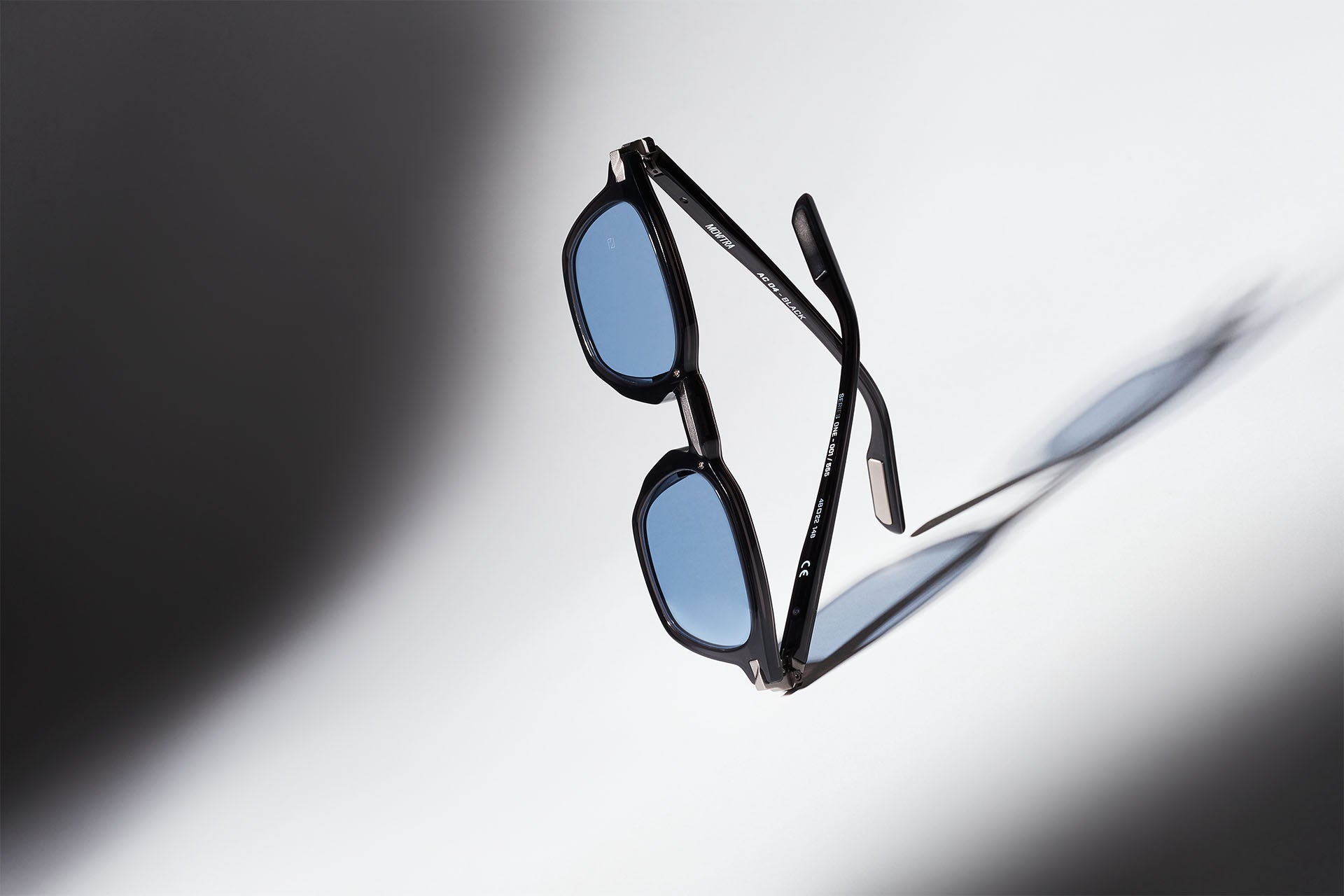 AC04 Black with Blue Lenses