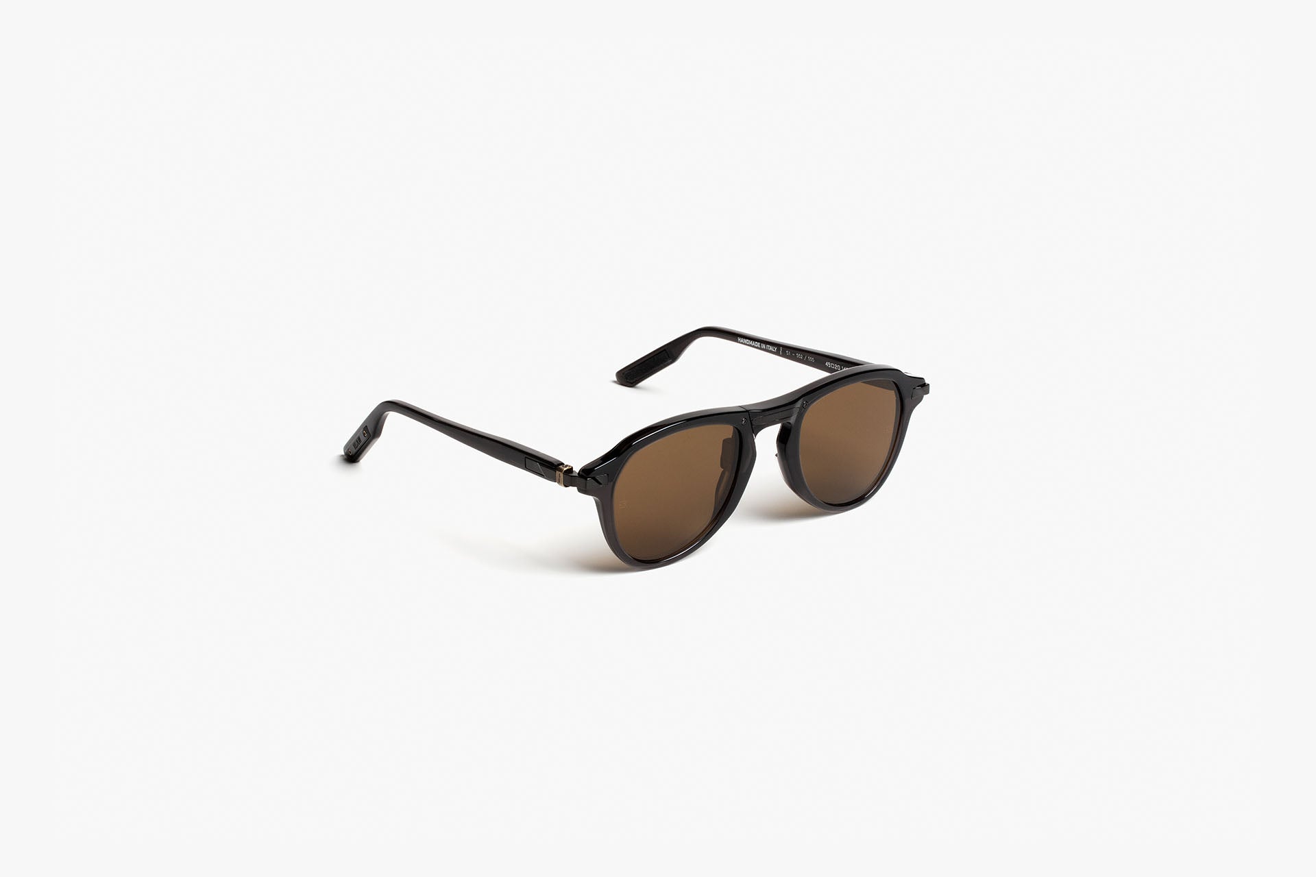 Status 06-C1 Crystal Black with Brown Lenses